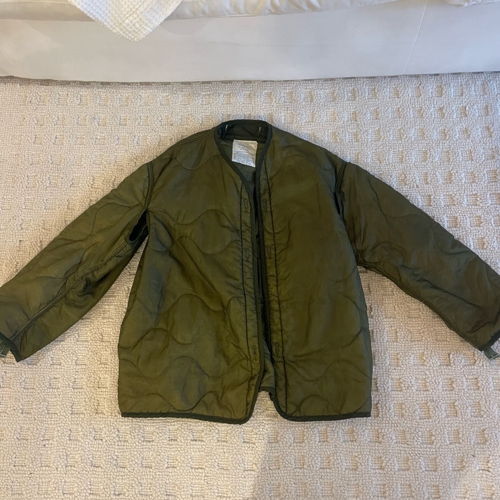 Green quilted jacket